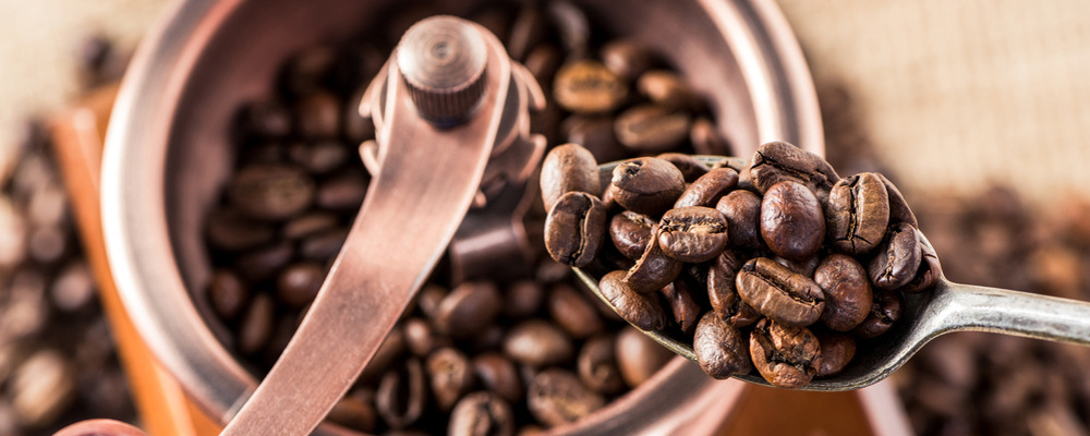 Coffee mill with coffee beans