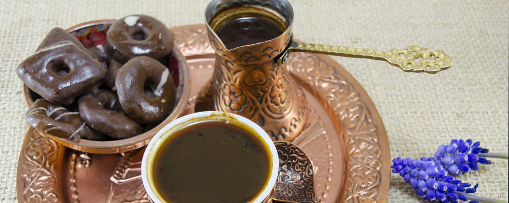 Turkish coffee with cookies and flowers