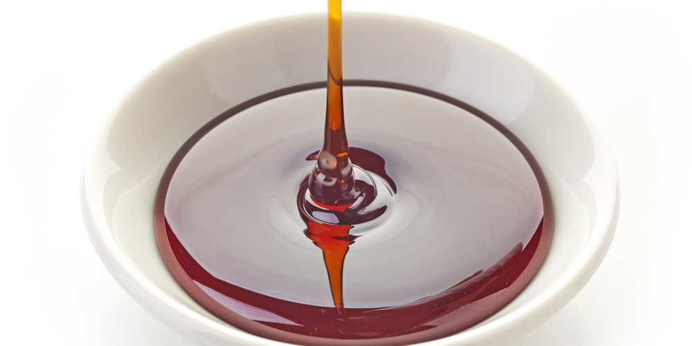 brown sugar syrup pouring into bowl