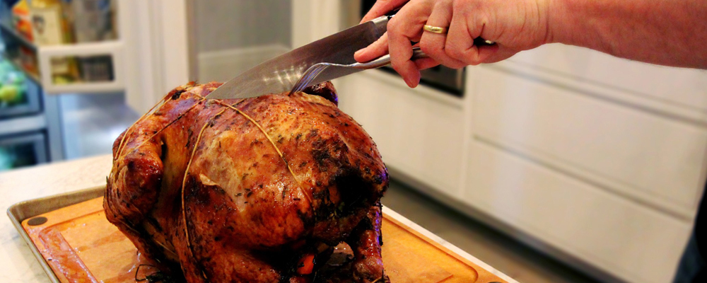 Man slicing a turkey